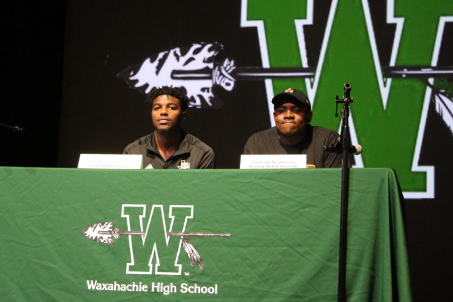 Seniors Demani Richardson and Ladarius Henderson sign their Letters of Intent Wednesday in the PAC.