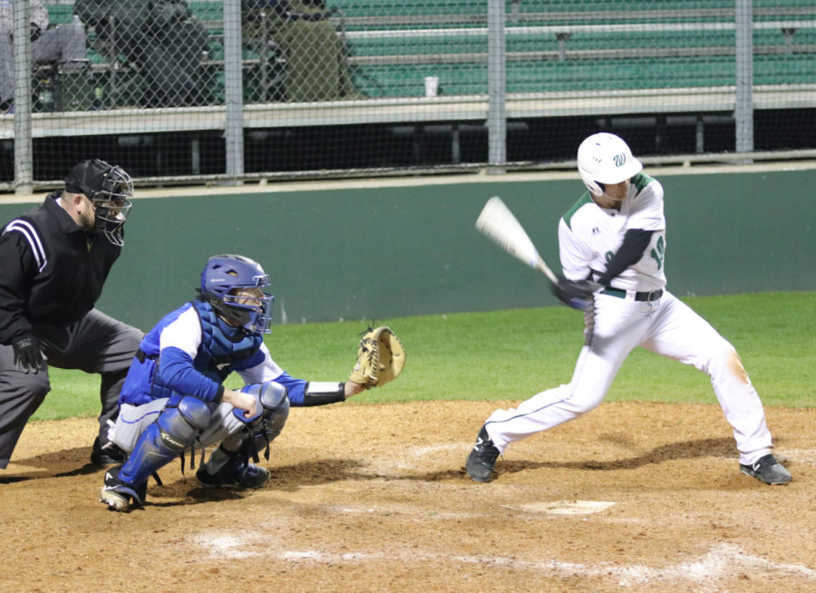 Jordan Fay takes a swing in the Indians loss to the Bryant (AR) Hornets.