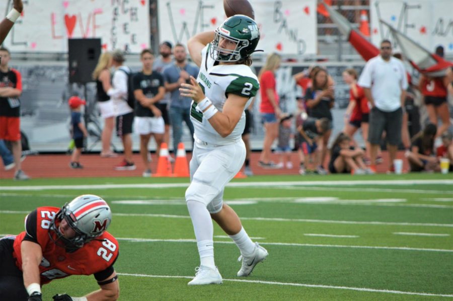 Indian quarterback Campbell Sullivan (2) makes a pass in the Indians' loss to Marcus on Sept. 13, 2019.