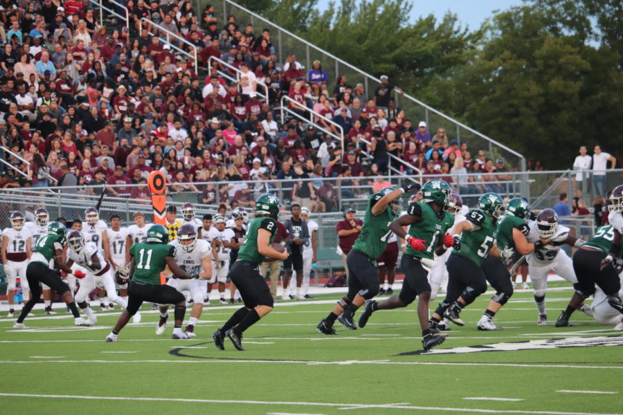 Campbell Sullivan (2) runs the football in the Indians' loss to Ennis.