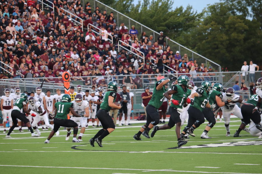 Campbell Sullivan (2) runs the football in the Indians loss to Ennis.