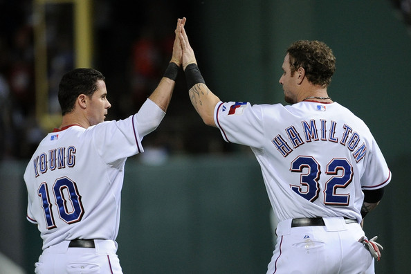 Texas Rangers' Josh Hamilton, left, is greeted by Adrian Beltre