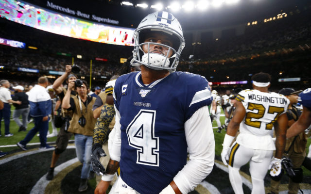 Dallas Cowboys quarterback Dak Prescott (4) walks off the field after an NFL football game against the New Orleans Saints in New Orleans, Sunday, Sept. 29, 2019. The Saints won 12-10. (AP Photo/Butch Dill)