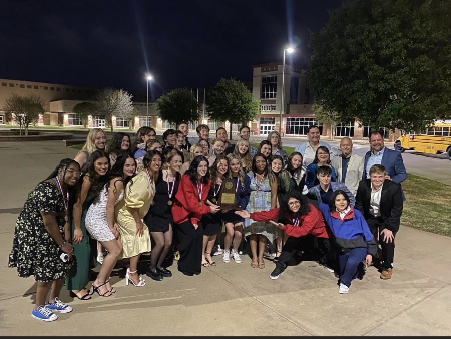 The One Act Play team poses with all their awards that were won during their area contest. 